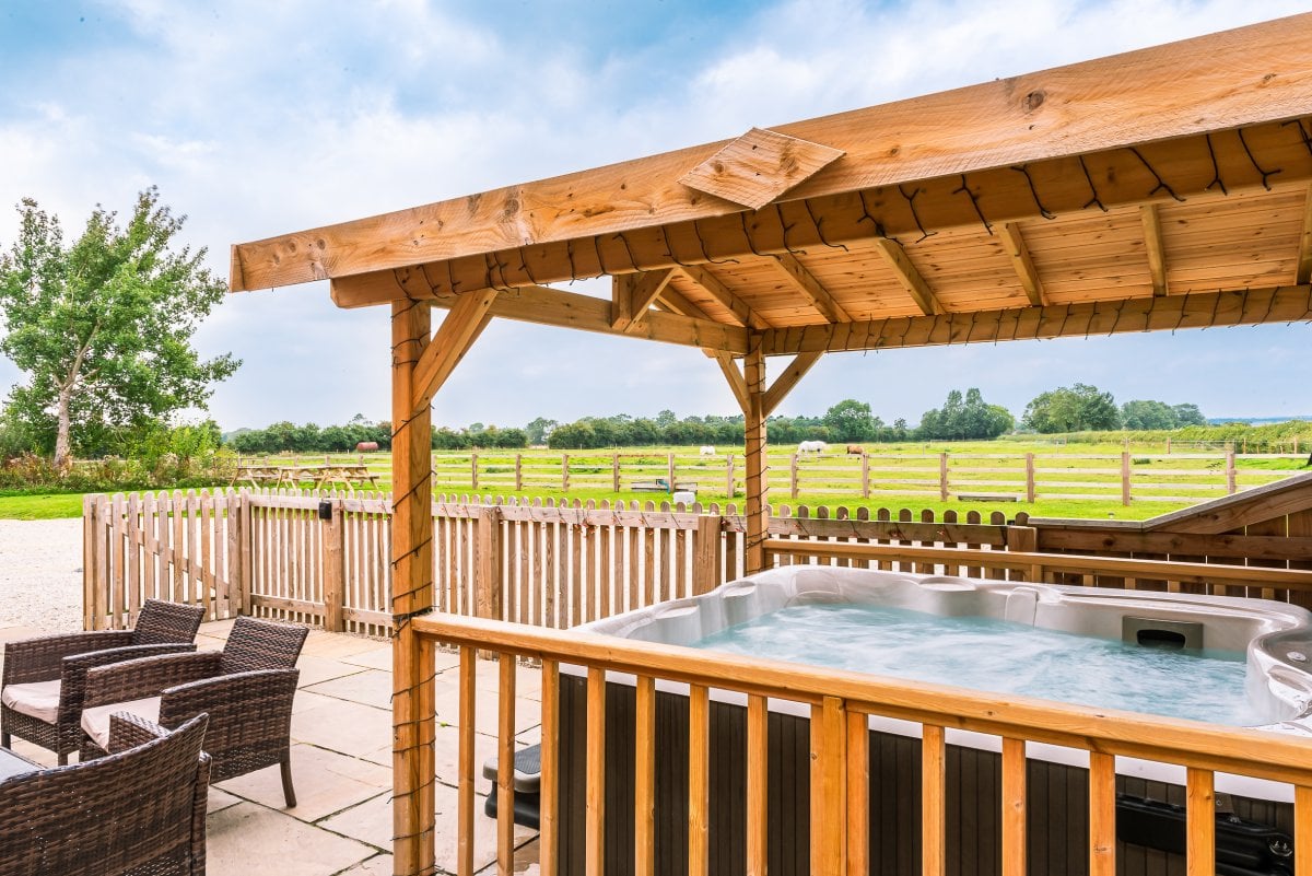 Our 8 seater hot tub with views across the meadows
